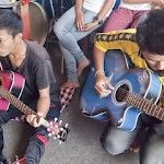Narayang and Bikram playing guitar